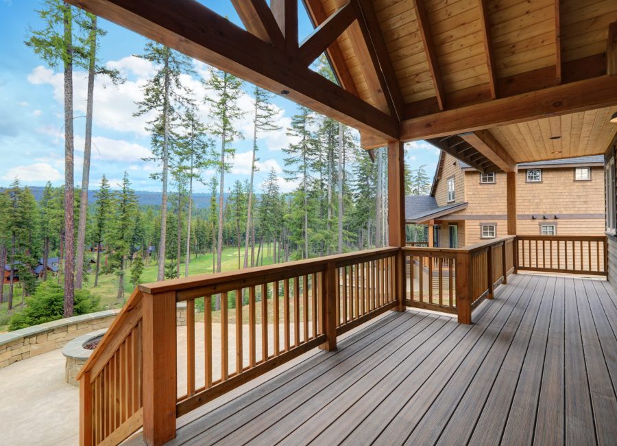 Beautiful large deck with stone patio and covered large roof ceiling.